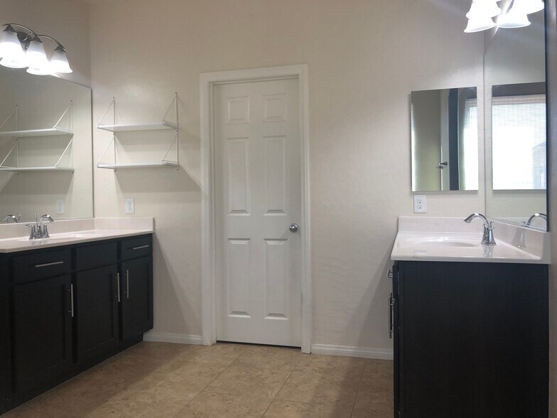 Master bedroom bath with two split faucet. Note that you have the toilet separate full privacy, the door leads to a walk-in - 263 Garden Trellis Ct