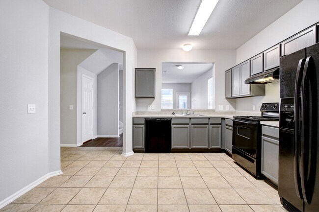 Building Photo - 3-Bedroom Townhouse with Open Floor Plan and Spacious Backyard Near Lackland AFB