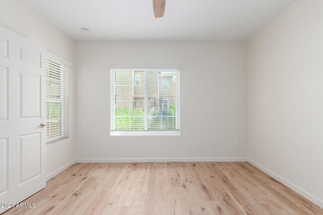 Building Photo - 9450 E Becker Ln