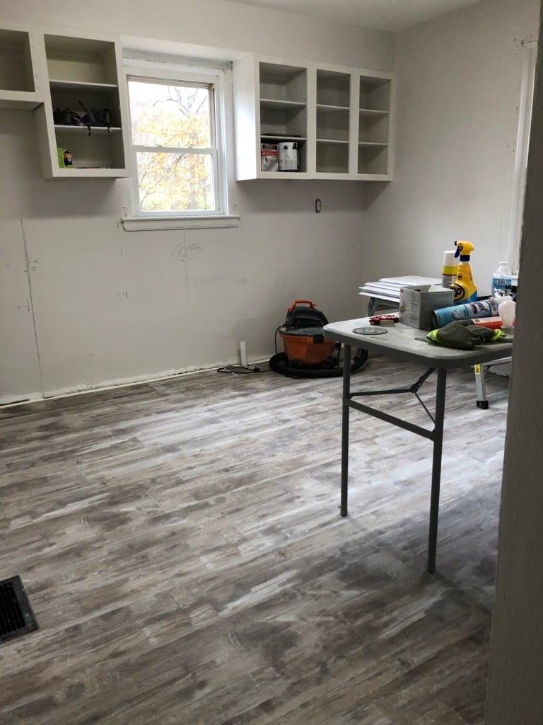 Reno update: Kitchen; highlighting floors and layout. What's next? Paint touch ups, new trim, new baseboards, new counter tops, and new doors. - 1395 Ross Ave