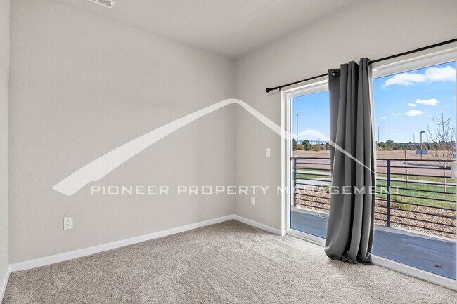 Building Photo - Contemporary Townhome in the Vibrant Interquest Low Maintenance Community with 2 car garage, Wash...