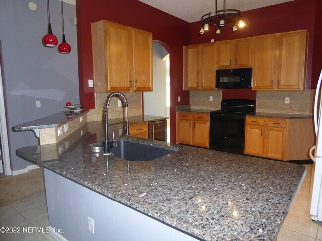 Building Photo - 8716 Canopy Oaks Dr