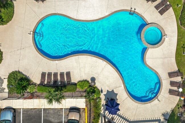 Building Photo - Welcome to Harbor Landing Condominiums — where coastal living meets convenience!