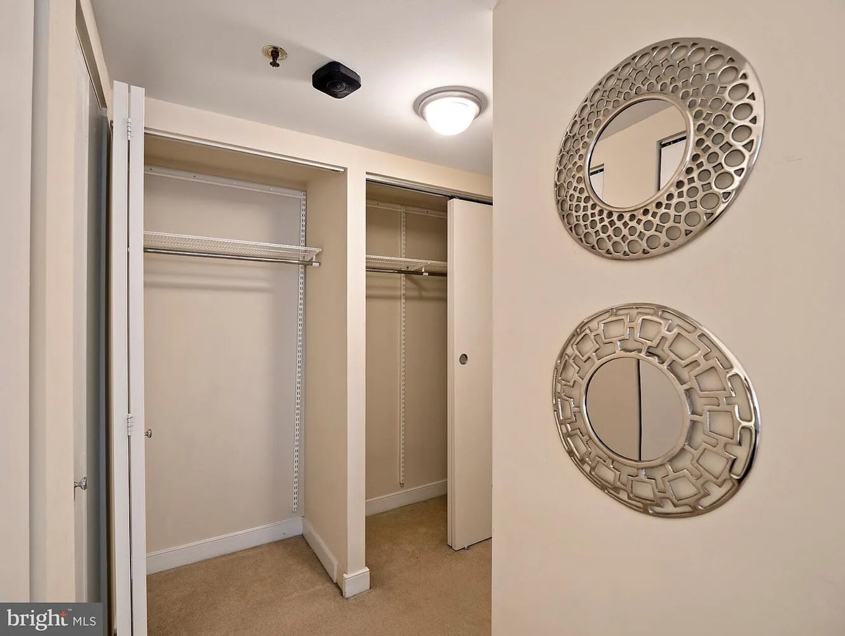 Two large closets, one medium closet, one linen closet - 7500 Woodmont Ave