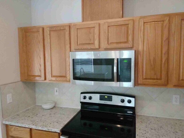 Brand new over the range microwave. - 808 South Edenbridge Way