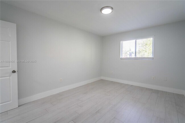 Building Photo - 465 NE 59th St