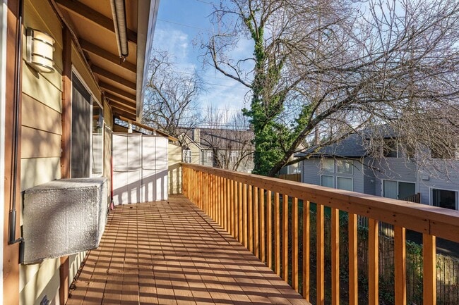 Building Photo - Updated 1 Bed / 1 Bath Upper-Level Condo with Balcony, Garage & A/C — Gated Community!