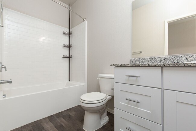 Building Photo - Newer three bedroom unit in gated communit...