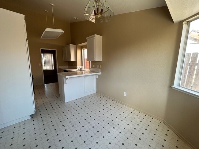 Building Photo - Spacious single story 3 bedroom home seeking new family!