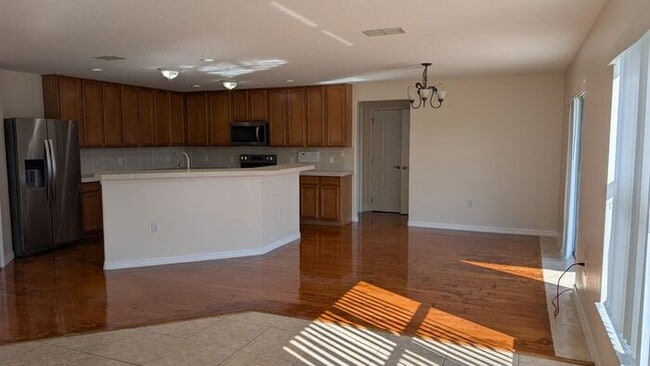 Building Photo - East Orlando spacious 3 bedrooms home with a large loft.