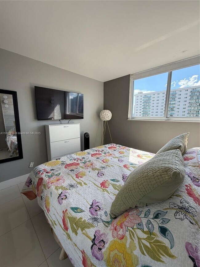 Building Photo - 19370 Collins Ave