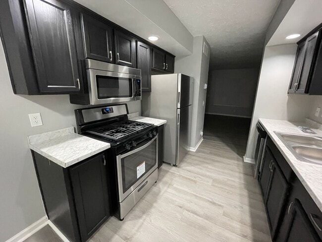 Building Photo - For Rent: Four-Bedroom, Two-Bathroom Available NOW