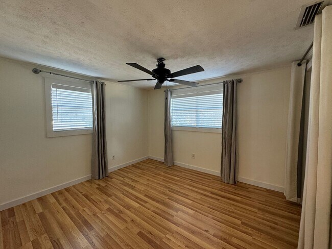 Building Photo - "Charming 2-Bedroom Duplex Oasis on Christmas Tree Lane – Your Perfect Panama City Beach Retreat!"