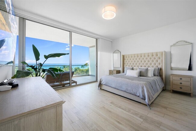 Building Photo - 10203 Collins Ave