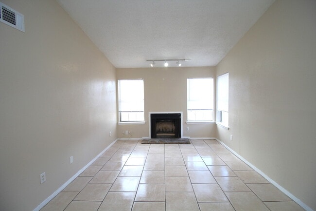 Building Photo - Updated Duplex with Patio & Fireplace