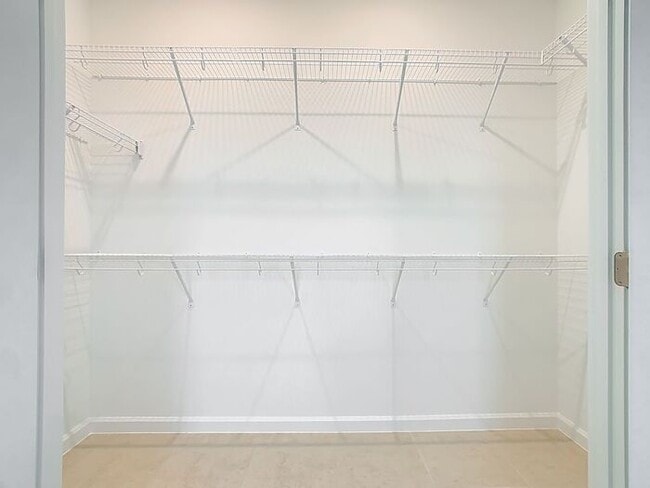 Building Photo - New Luxury Townhome in Celebration, FL Corner unit. All porcelain tiled floors. Aleutian model by...