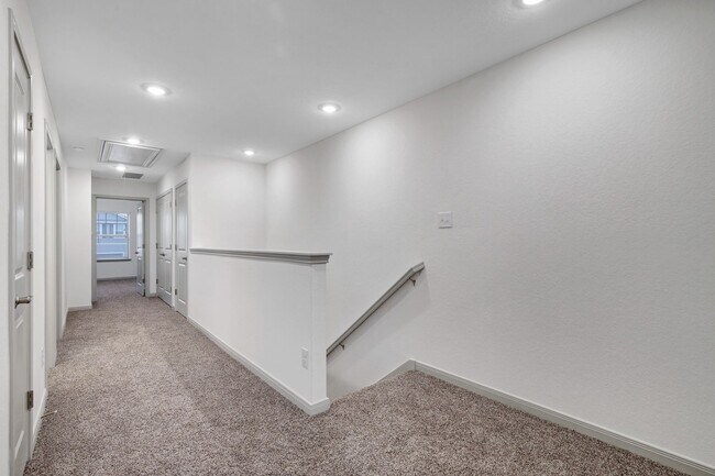 Building Photo - Beautifully Designed Townhome with Upscale Finishes