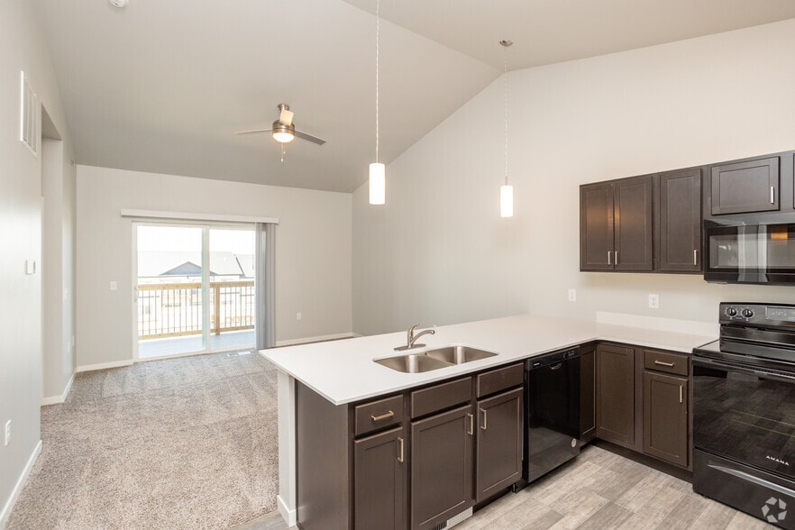 1BR, 1BA - 860SF - Kitchen/Living Room - The Apex