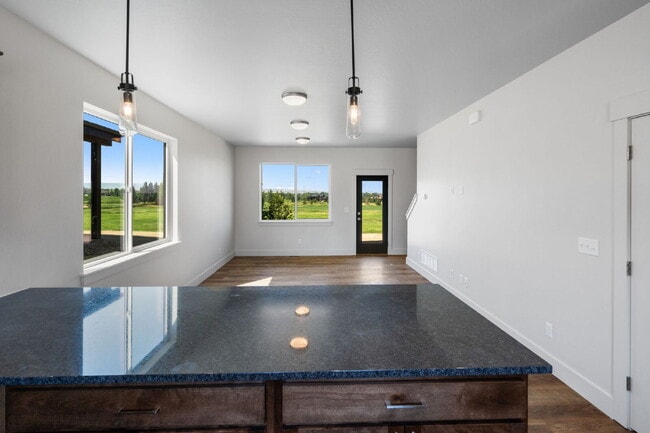 Building Photo - Lock-and-Leave Luxury Living — Lawn Care & Snow Removal Included!