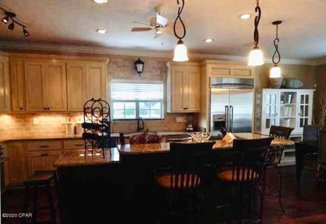 Building Photo - WATERFRONT W/BOAT SLIP!!!! This beautiful home is located in a gated community on North Lagoon Dr...