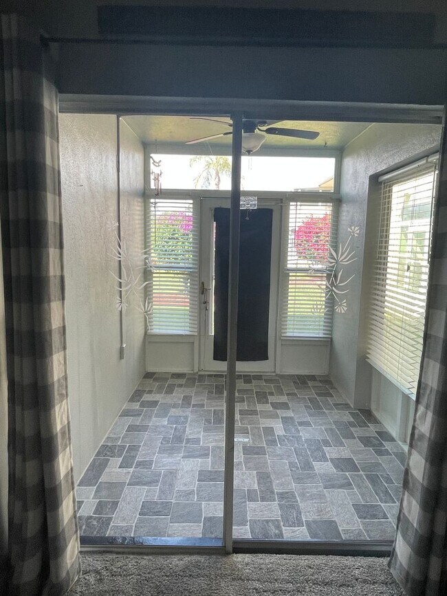 Building Photo - 55+ Charming first-floor condo nestled in ...