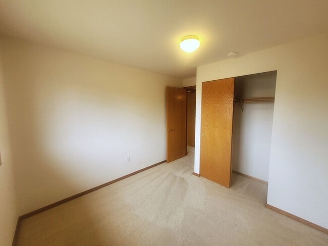 Building Photo - Charming Split-level 4 Bedroom Home - E Mc...