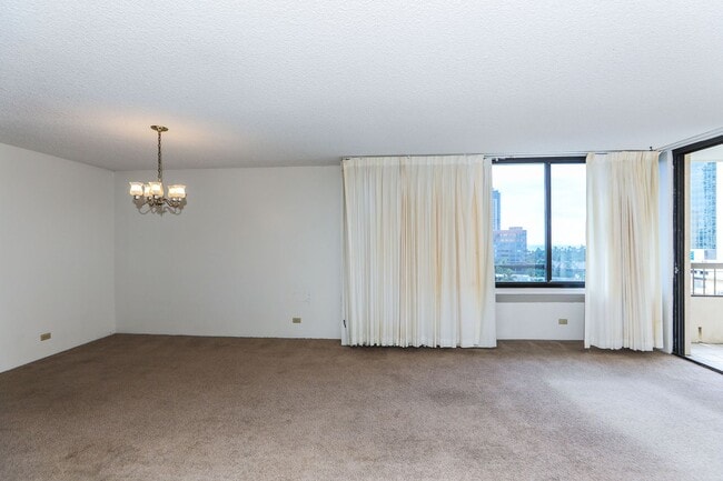 Building Photo - Aloha Towers - 2 bedroom, 2 bath corner unit with 1 covered parking stall