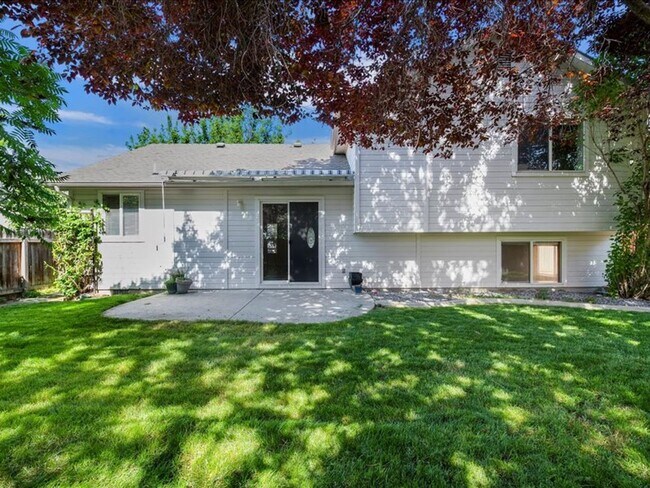 Building Photo - June Rent Free!!  Move Today!  Four Bedroom, Three Bath Home with Beautiful Backyard, Two Car Gar...