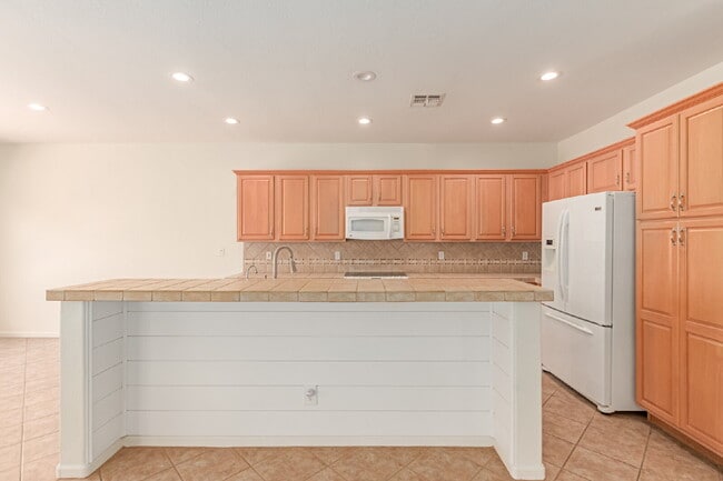 Building Photo - "Charming 2-Bedroom + Den Oasis with Spaci...