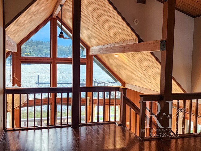 Building Photo - Waterfront Living in Indianola – Dock, Bea...