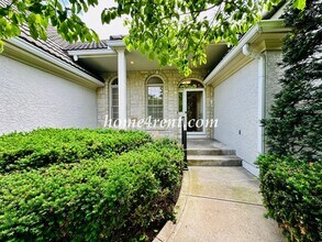 Building Photo - Exceptional 1.5 Story Home in the Prestigious Loch Lloyd Community!