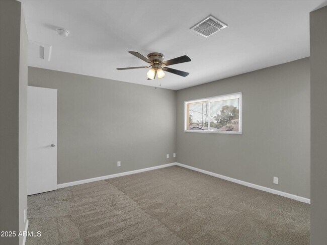 Building Photo - 8522 E Montebello Ave
