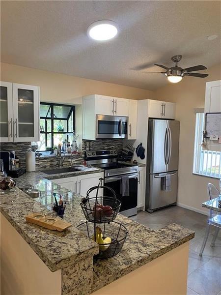 Building Photo - 8615 Jasmine Way