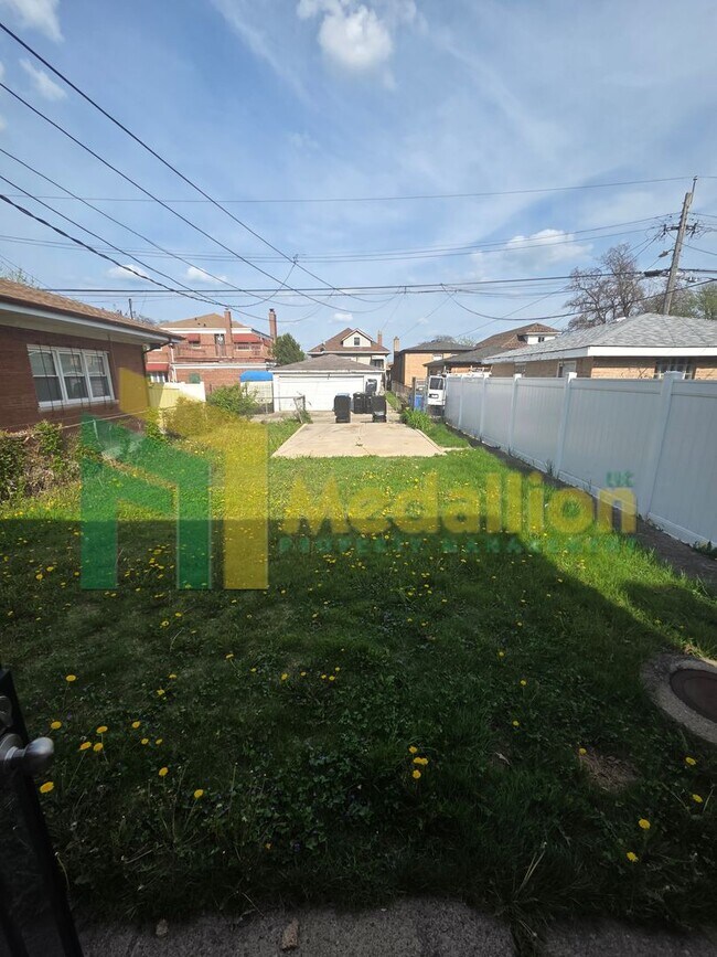 Building Photo - Spacious 6-Bedroom Home with Finished Basement and Backyard