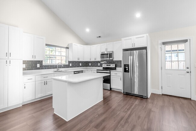 Building Photo - LIVE CLOSE TO THE ACTION — Modern 3-Bedroom Rental in Charlotte’s Reid Park!