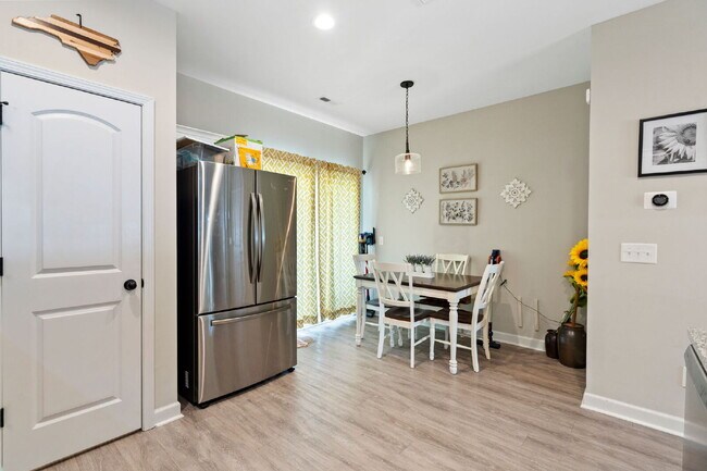Building Photo - Available Now! Enjoy low-maintenance coastal living in this beautiful 2-bedroom, 2.5-bath townhom...