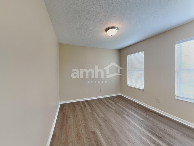 Building Photo - 6297 Satin Wood Dr