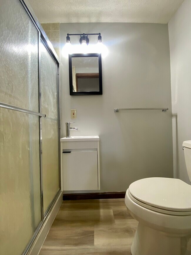 Basement: A convenient en suite bathroom in the non-conforming room - 12821 Westwood Ln