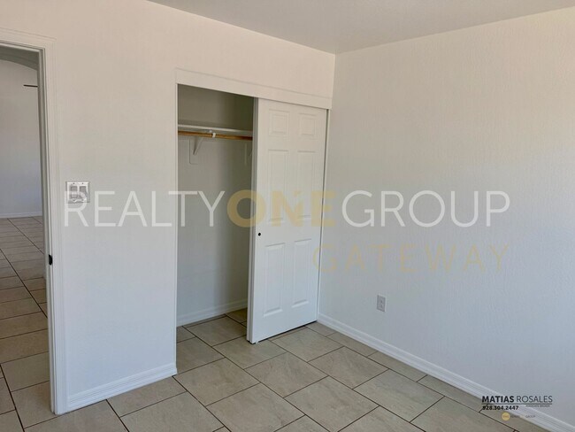 Building Photo - Three Bedroom Two Bath Home with All Tile ...