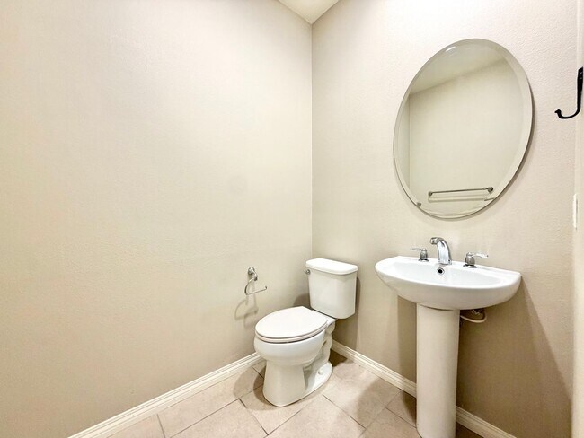 Building Photo - Move-In Ready 2 Bedroom 2.5 Bathroom Condo with LOFT & 2 Car Garage