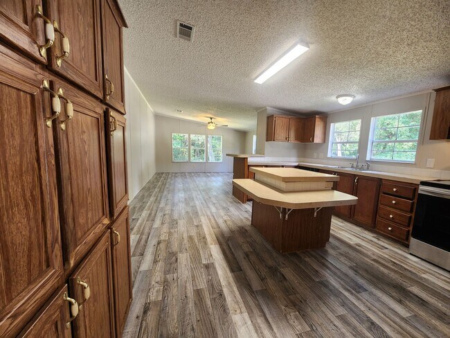 Building Photo - 3 Bed 2 Bath  FENCED land w/ Workshop 3 Miles from WEC!