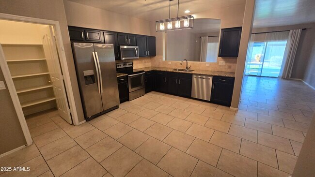 Building Photo - 17848 W Acapulco Ln