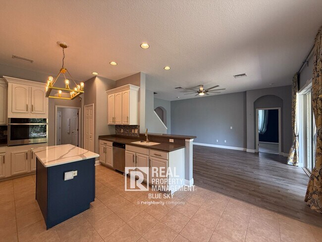 Building Photo - Executive Home with Custom Finishes in Gat...