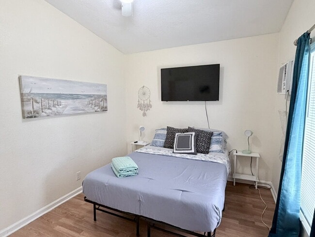 Building Photo - Available: Bedroom in a shared living environment.
