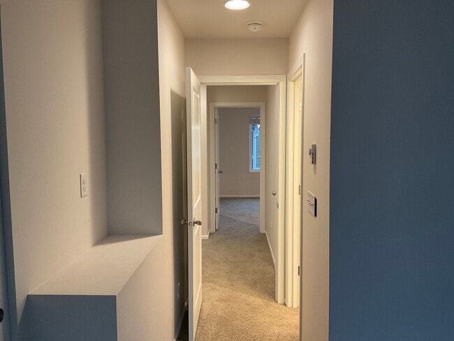 Building Photo - Riverfront Townhome with Tandem Garage & Fenced Yard