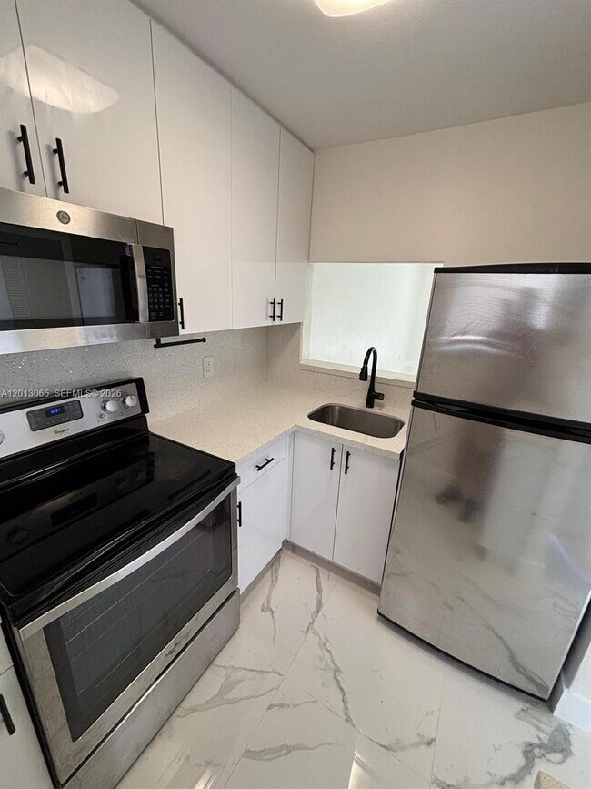 Building Photo - 4298 NW S Tamiami Canal Dr