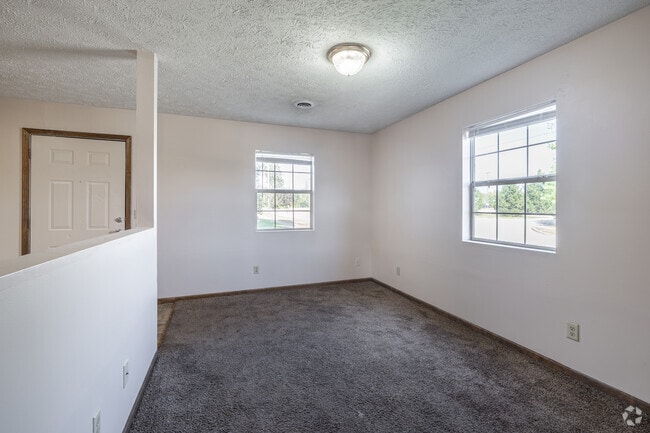 2BR, 1BA - 700SF - Living Room - Riverside Apartments