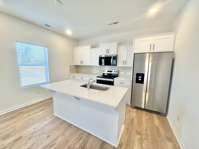 Building Photo - NEW 4 br 2.5 ba with loft and private study in the Kensington community READY JUNE 2026