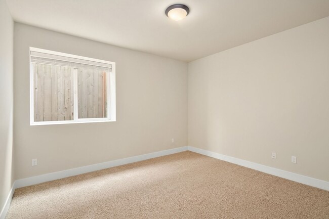 Building Photo - Water Views| Expansive Deck | Flexible Living Spaces