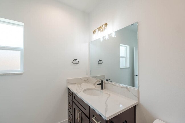 Building Photo - NEW CONSTRUCTION 1BD W/GARAGE & YARD